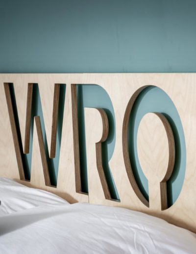 headboard of the bed in wro.place